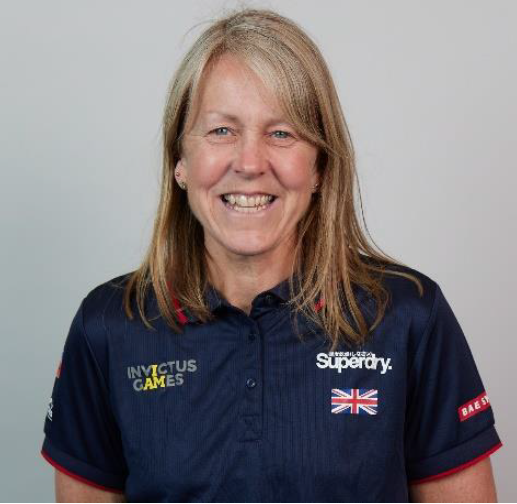 Personnel wears Invictus Games uniform in portrait.